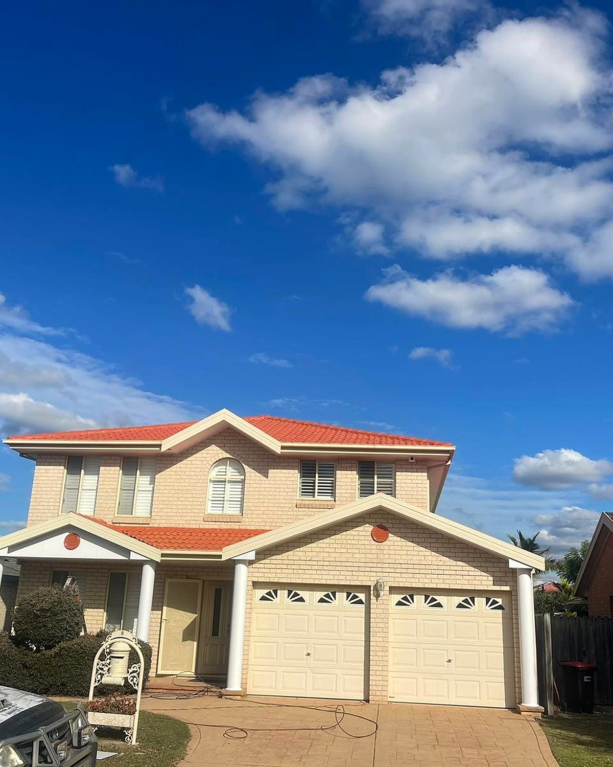 Completed two-storey home with a fully restored terracotta tile roof